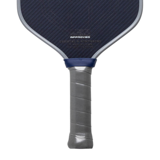 Close-up of a pickleball paddle with a blue and gray design on a white background