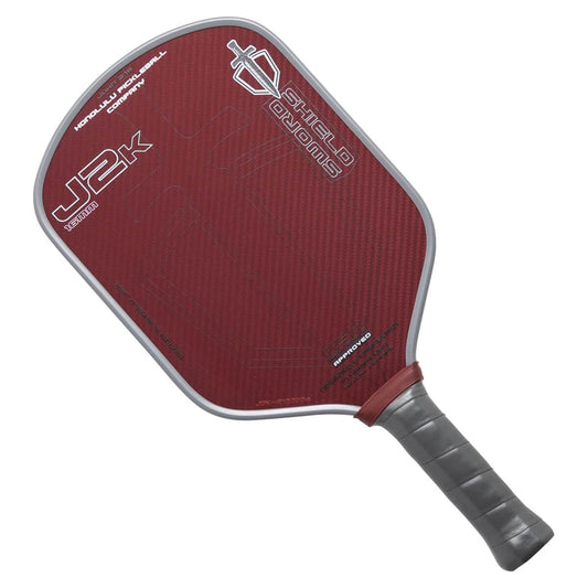 Red pickleball paddle with gray handle on a white background