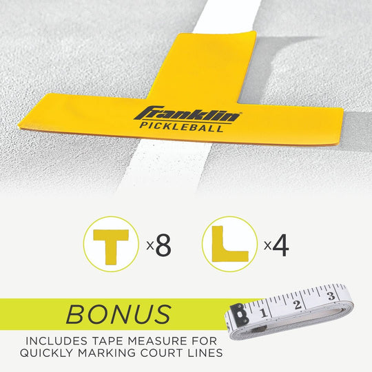 Yellow Franklin pickleball court marking tape with a tape measure on a gray background