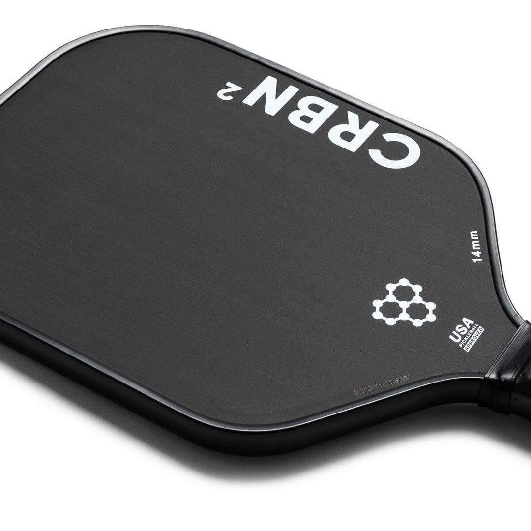 “CRBN² Carbon Widebody 16 mm pickleball paddle — raw T700 carbon face (Black/White)” (swap to 14 mm as needed)