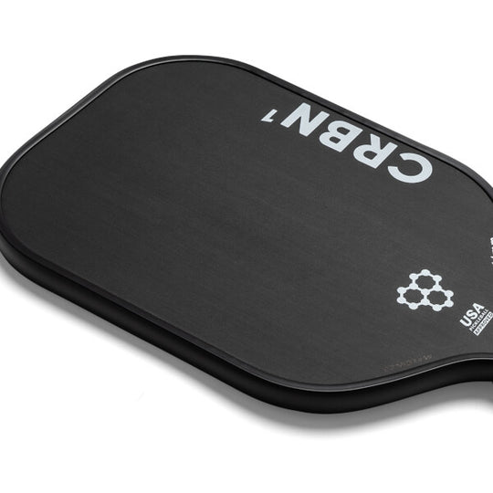 CRBN¹ 14mm elongated pickleball paddle — raw T700 carbon face
