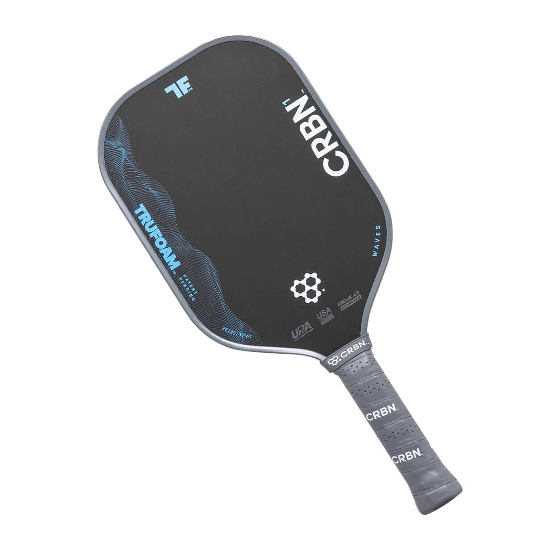 Pickleball paddle with CRBN branding on a white background