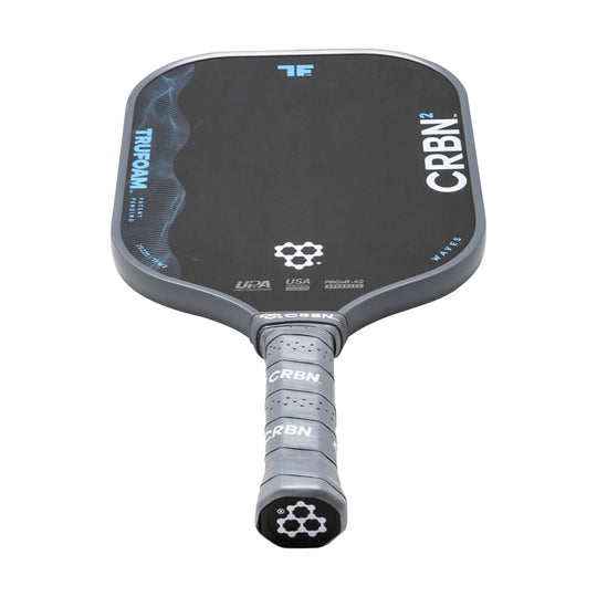 Pickleball paddle with CRBN branding on a white background