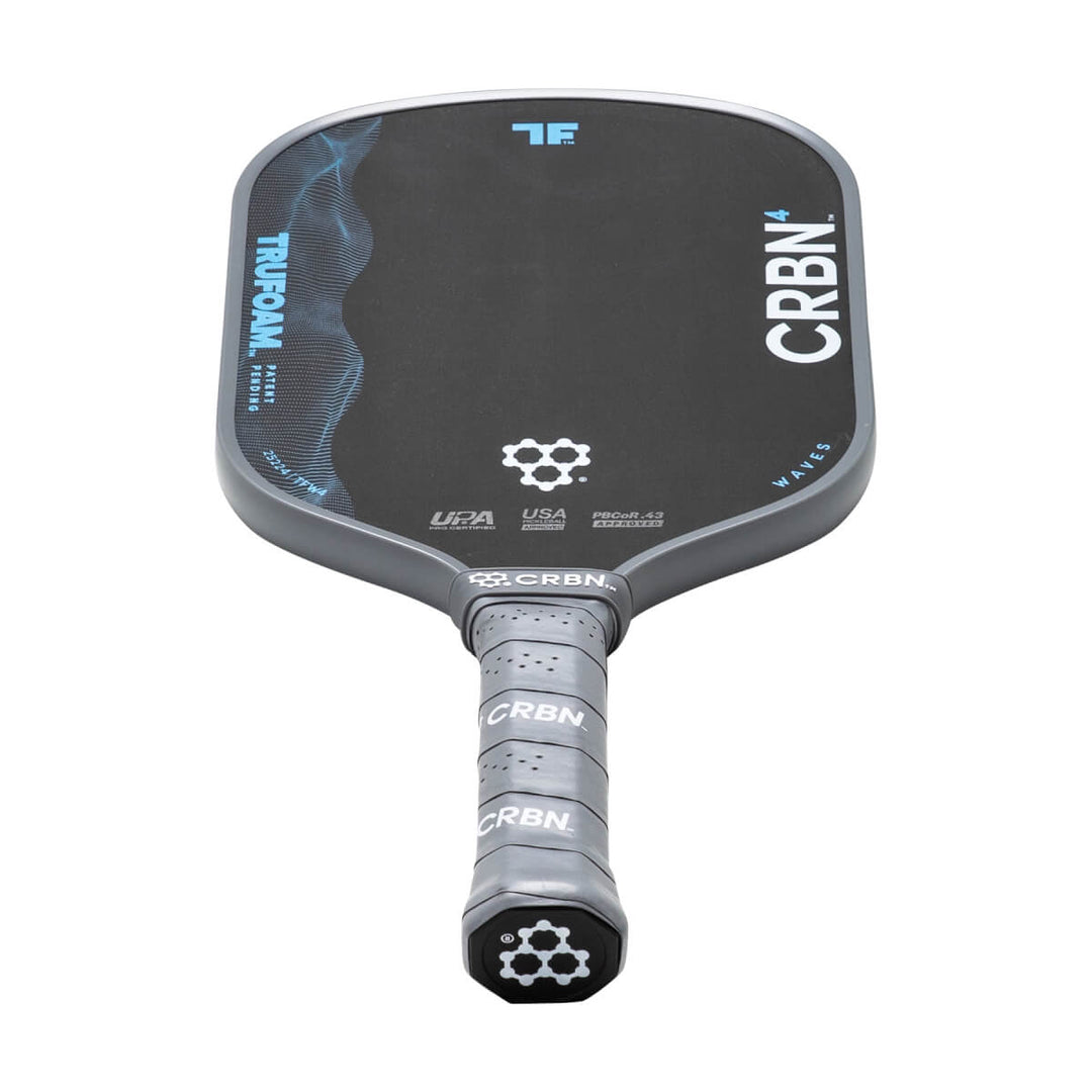 Pickleball paddle with CRBN branding on a white background