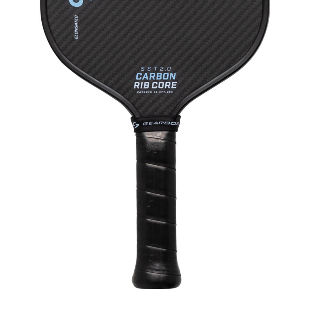Black pickleball paddle with text on a white background