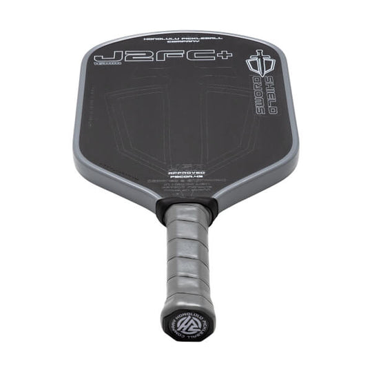 Pickleball paddle with 'J2FC+' branding on a white background