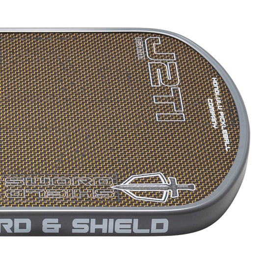 Close-up of a textured surface with 'Shield & Shield' branding on a white background