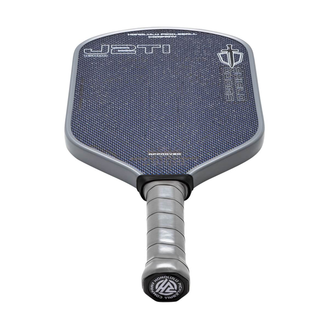 Pickleball paddle with 'J2TI' branding on a white background