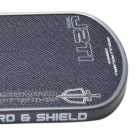 Close-up of a textured black and gray product with 'UFTI' branding on a white background